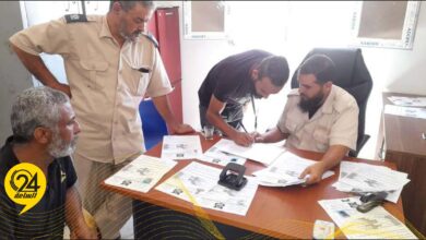 أمن أجدابيا: توزيع بطاقات حصر الأجانب بالمنطقة وتسليمها إلى كفلائهم الليبيين