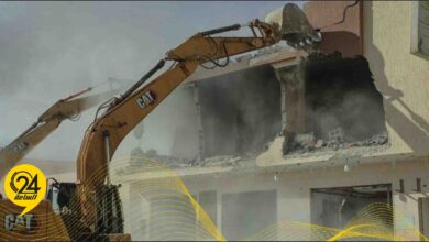 تنفيذا لتعليمات النائب العام.. هدم مباني مخالفة بشارع النخيل في بني وليد
